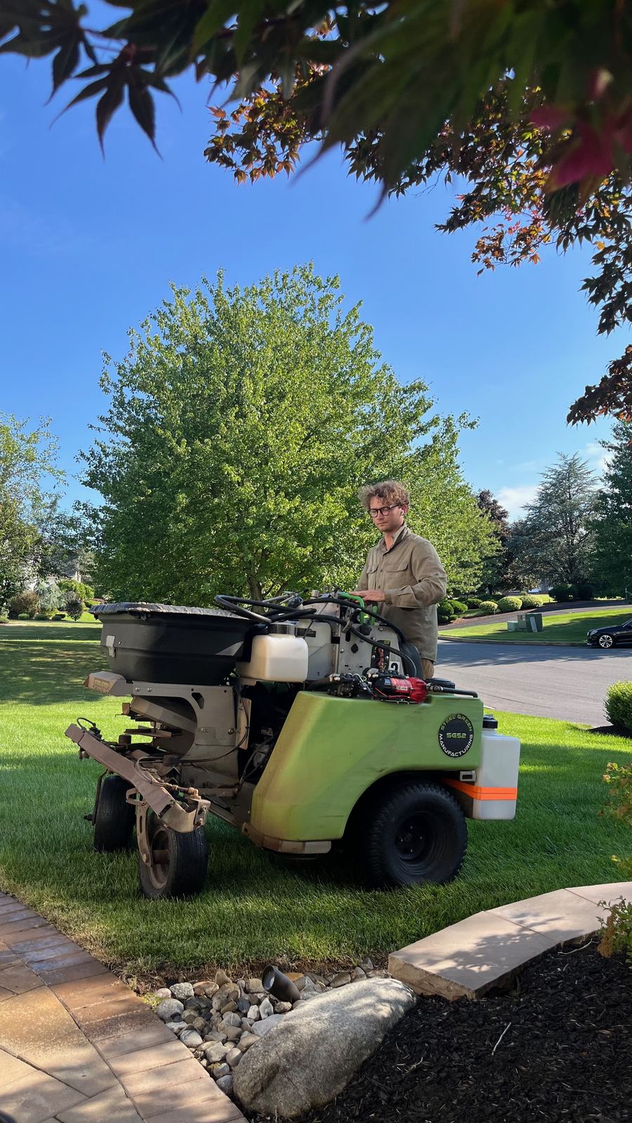 Our crew applying a lawn treatment